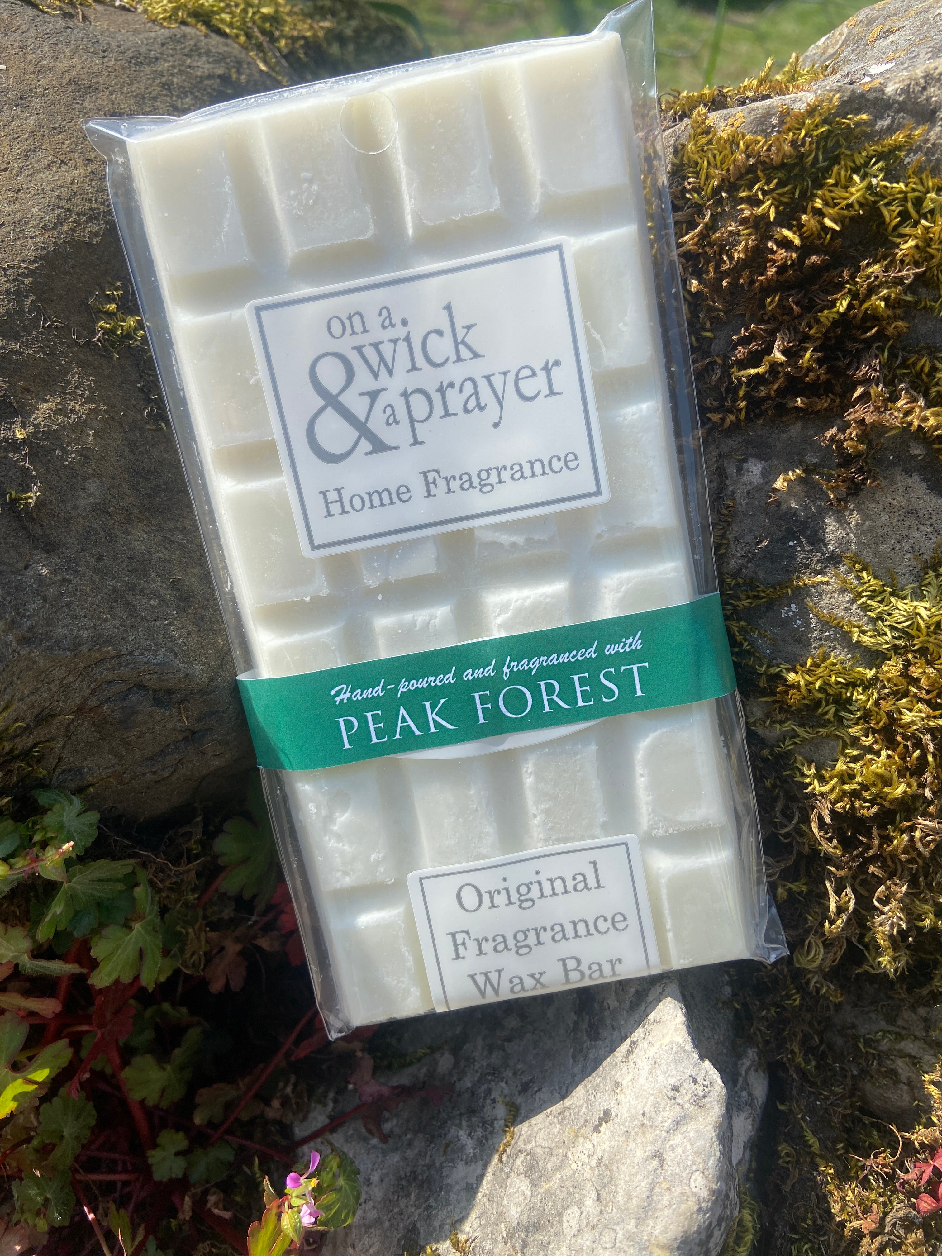 Peak Forest Fragrance Wax melt bar on a stone background